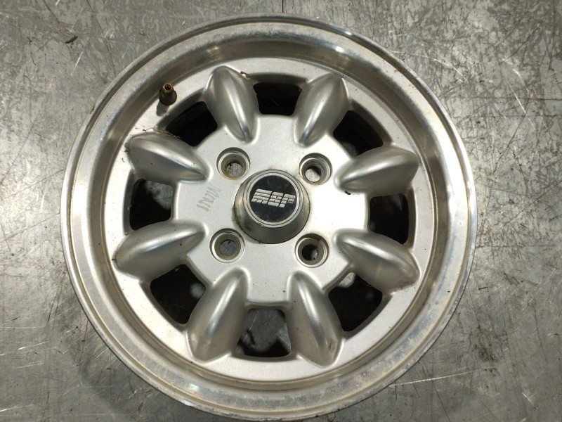 Recambio de llanta para rover mini hatchback 1000 referencia OEM IAM FE848  